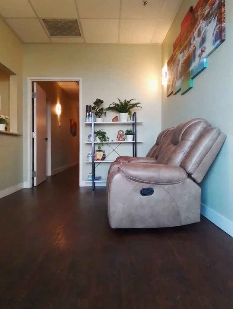 Real interior lobby of Yes SPA Las Vegas with leather recliner and waterfall artwork